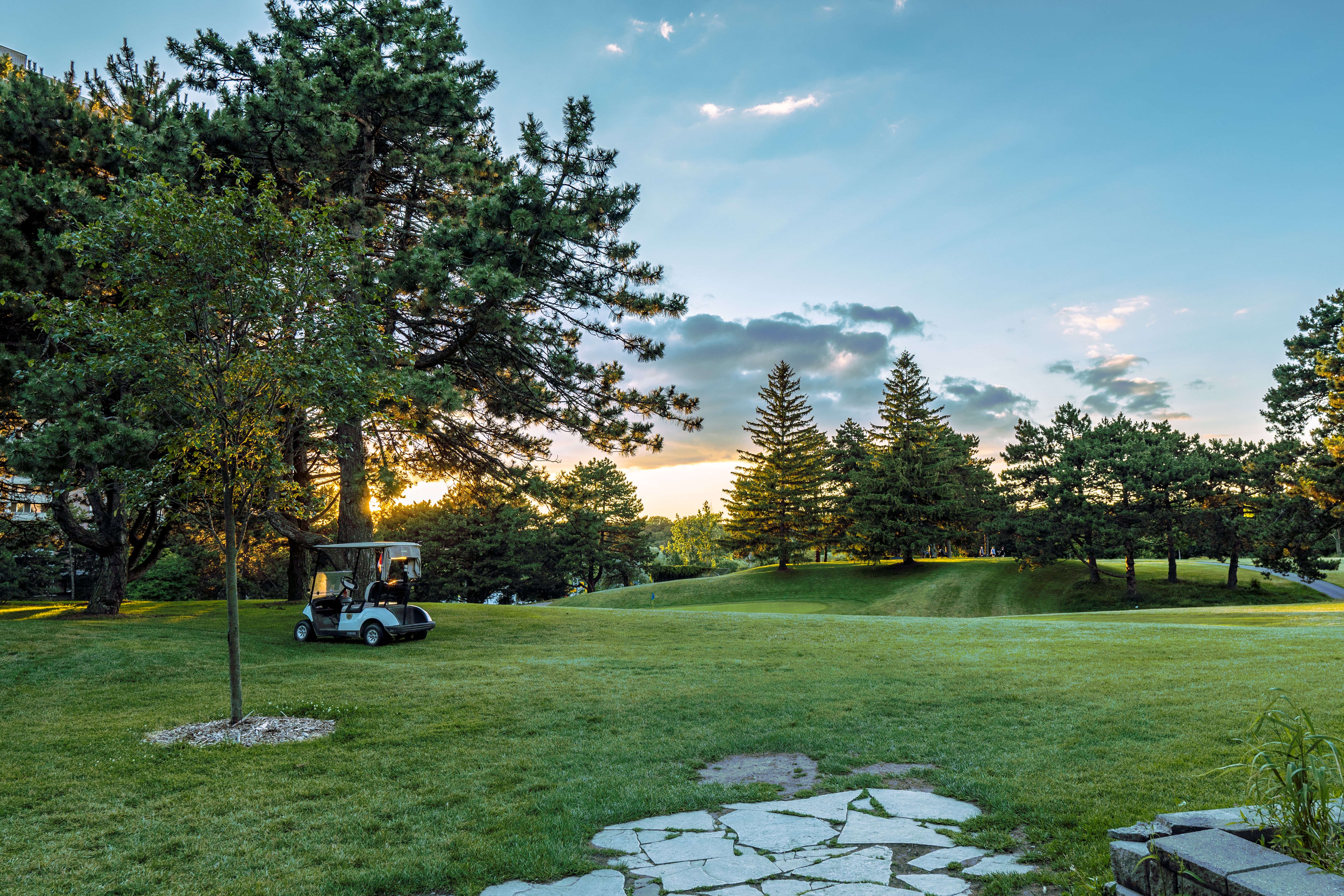 Golf resort fairway at sunset